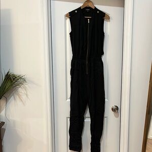bebe Black Jumpsuit with Sleeveless Design and Tapered Legs